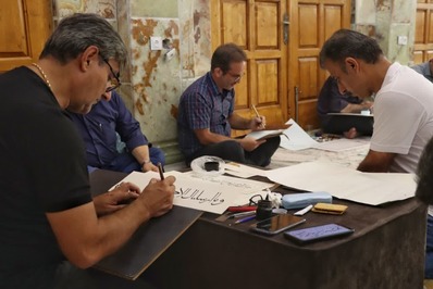 کتابت آیاتی از کلام وحی در محکومیت هتک حرمت قرآن در رشت انجام شد