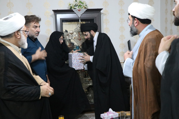دیدار حجت الاسلام و المسلمین راجی با خانواده شهدای جنگ رمضان